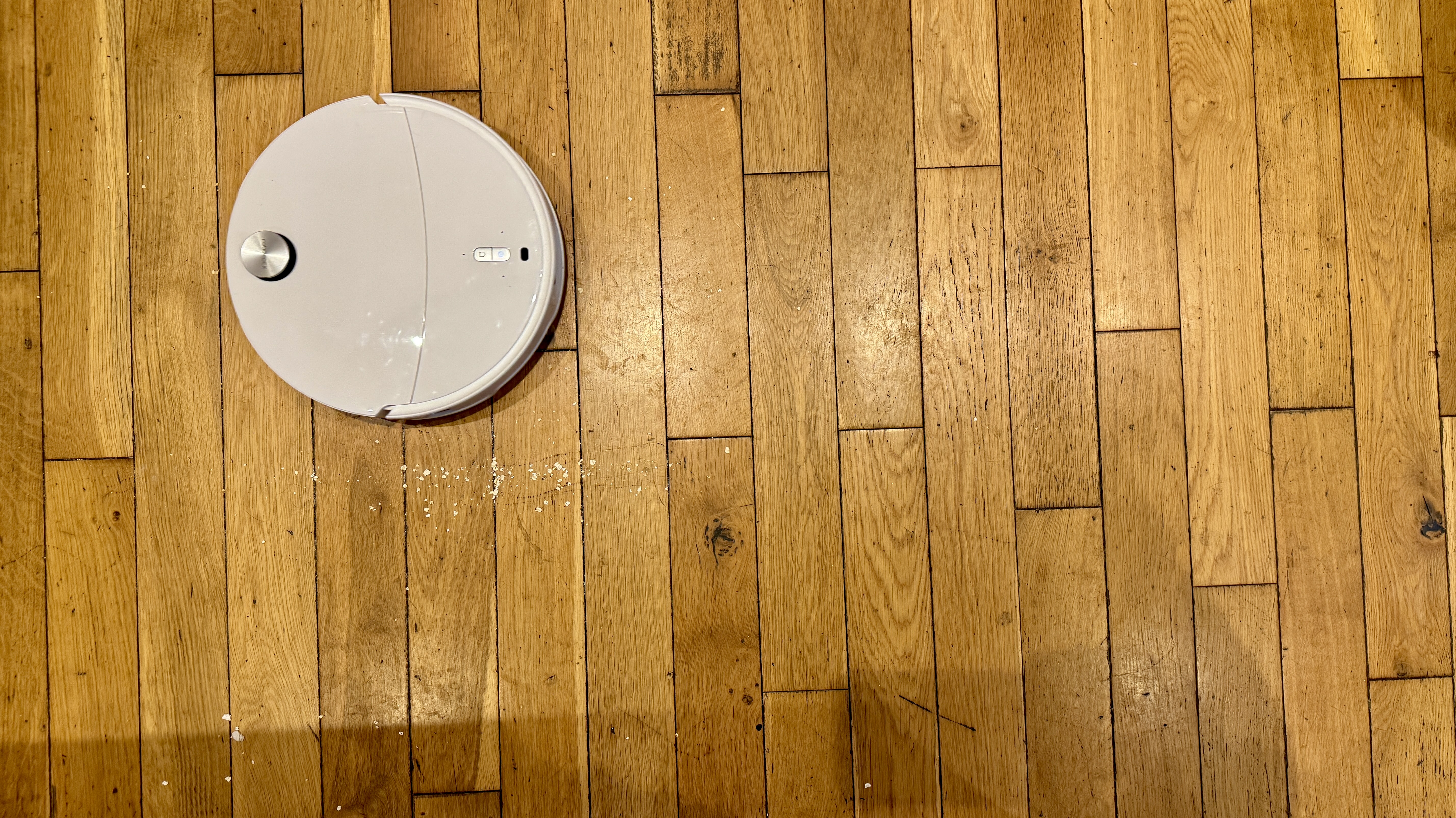 Roborock Qrevo Curv 2 Pro robot vacuum after the suction test on hard flooring