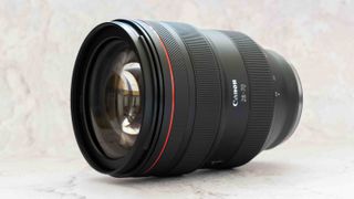 Canon RF 28-70mm f/2 L USM Lens on a marble background