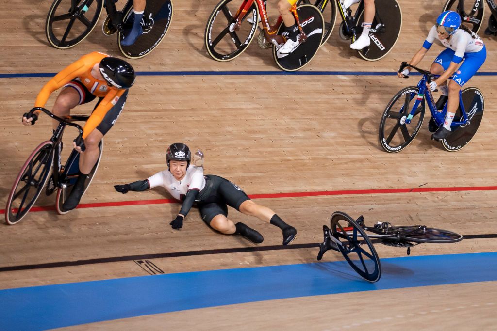 IZU JAPAN AUGUST 08 Yumi Kajihara of Team Japan reacts after falling during the Womens Omnium points race 4 round of 4 of the track cycling on day sixteen of the Tokyo 2020 Olympic Games at Izu Velodrome on August 08 2021 in Izu Shizuoka Japan Photo by Justin SetterfieldGetty Images