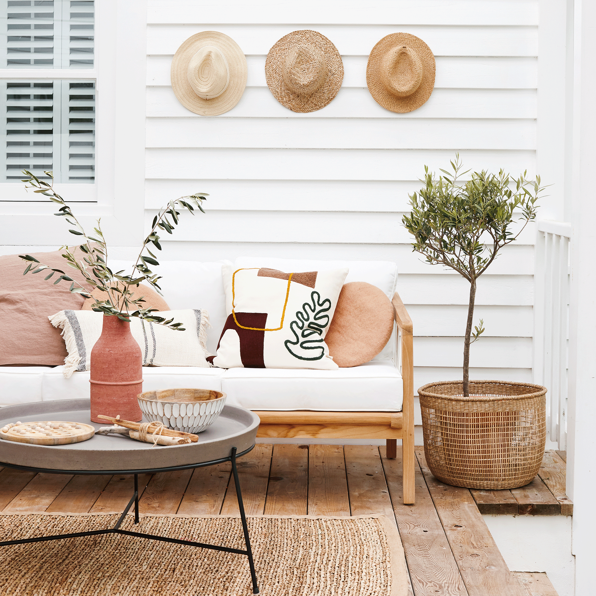 White outdoors with straw hats