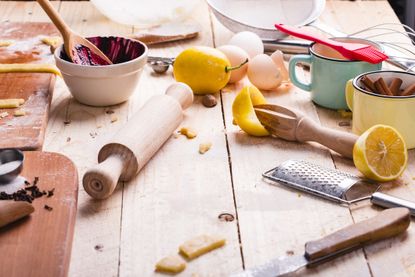 A cook with pancake problems with a messy kitchen.