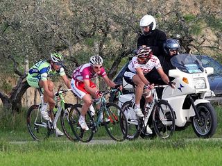 Enrico Gasparotto (Barloworld) forms the escape group with Fabian Cancellara (Team CSC) (r) and Filippo Pozzato (Liquigas) (l).