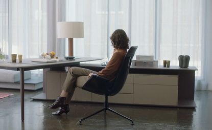Female sitting at desk