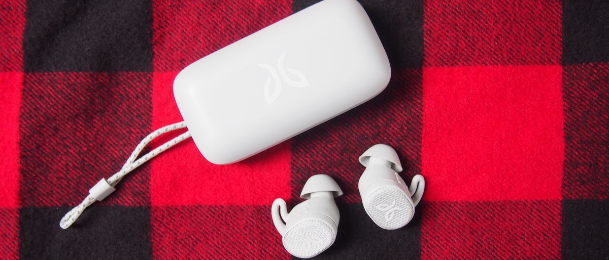 The jaybird vista 2 true wireless earbuds in white next to their charging case