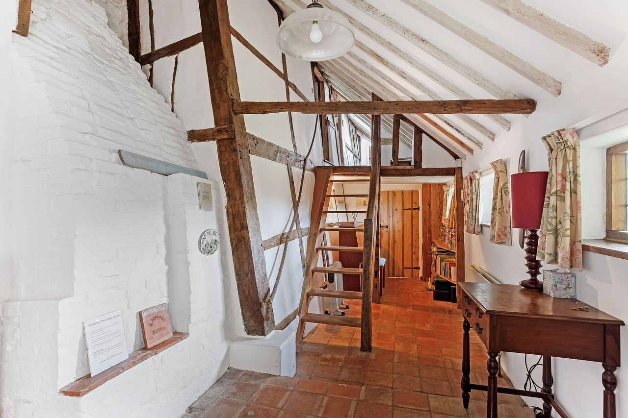 Images of a very wonky house called The Cottage