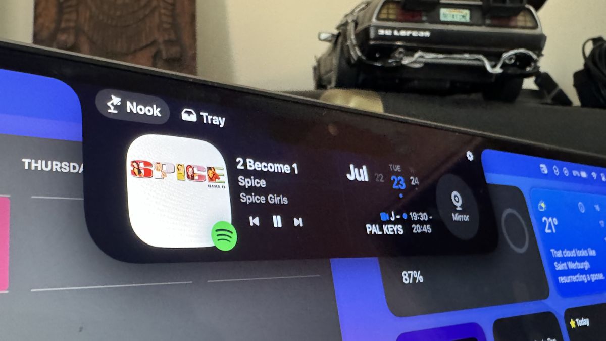 NotchNook showing music and calendar