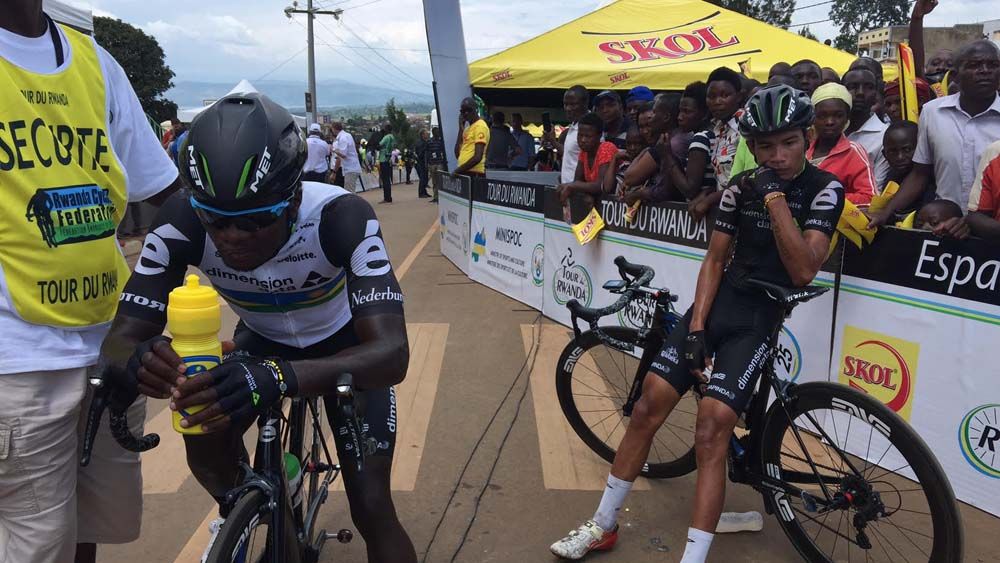 Riders wait for the start of stage 3 under the watchful gaze of the fans