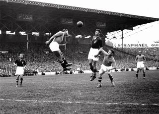 Italy take on Hungary in the 1938 World Cup final at the Stade Olympique de Colombes in Paris.