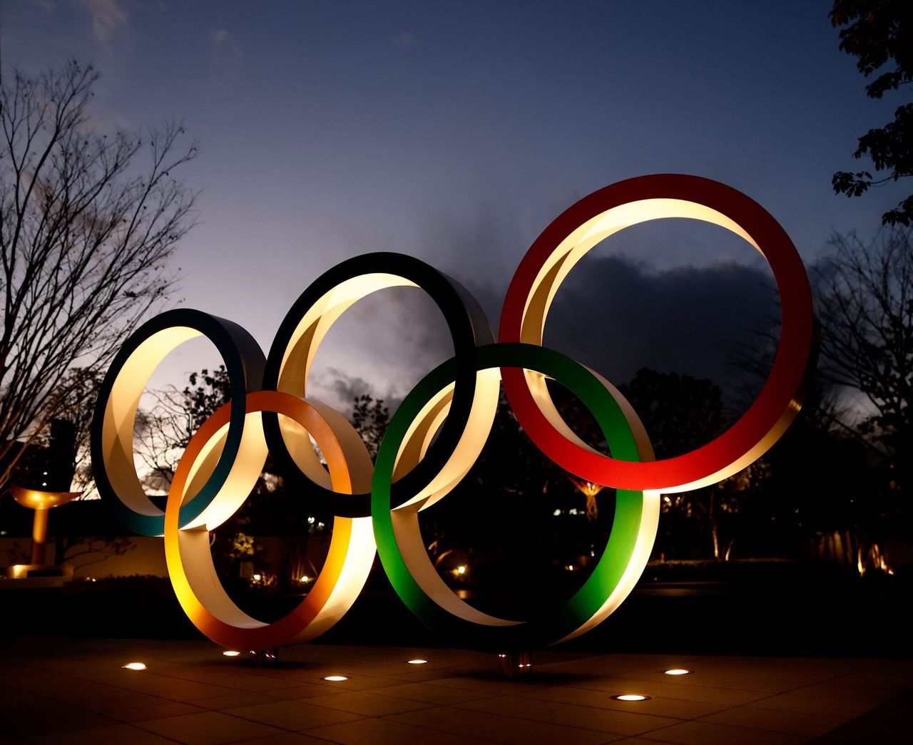 Olympic Rings are seen near the National Stadium, the main venue for the Tokyo 2020 Olympic and Paralympic Games, in Tokyo on January 8, 2021, as Tokyo Olympics organisers insisted that the coronavirus-postponed Games will still go ahead despite Japan declaring a state of emergency less than 200 days before the opening ceremony. (Photo by Behrouz MEHRI / AFP) (Photo by BEHROUZ MEHRI/AFP via Getty Images)