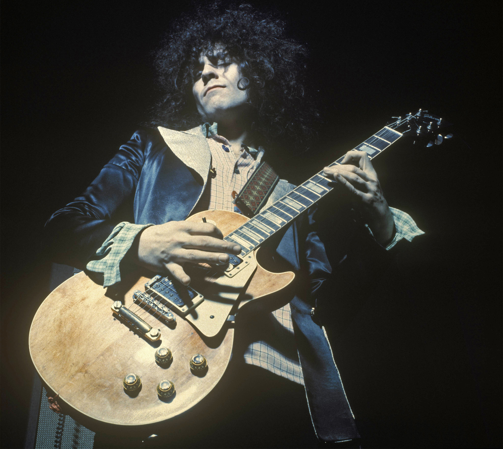 T REX and Marc BOLAN; performing live onstage, playing Gibson Les Paul guitar