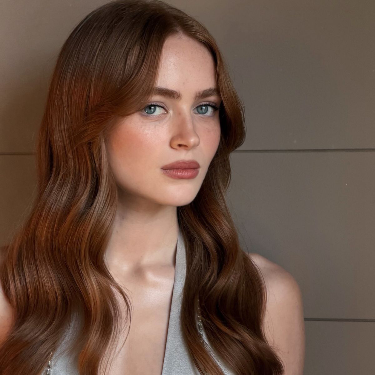 Sadie Sink with a burnt amber hairstyle
