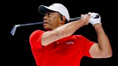 Tiger Woods takes a shot during a TGL contest