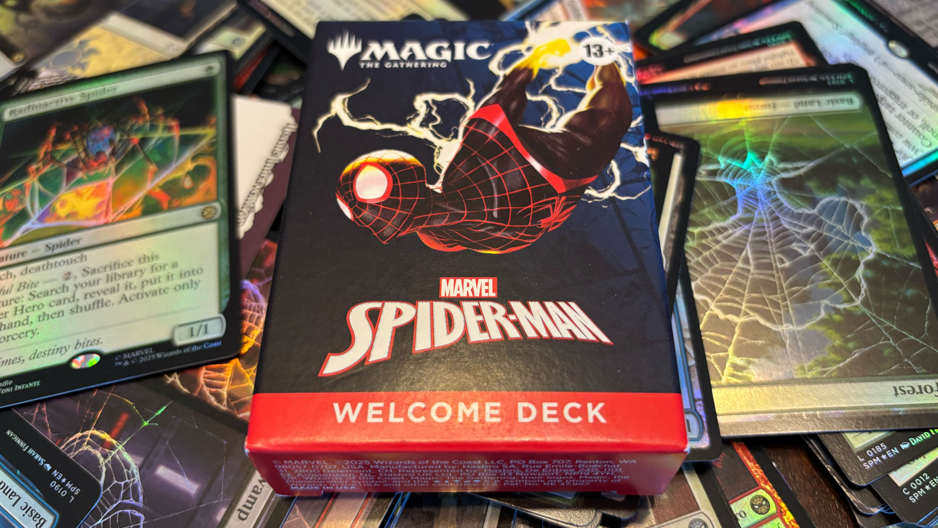 MTG Spider-Man Welcome Deck on top of an array of cards
