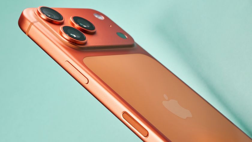 Apple iPhone 17 Pro in cosmic orange on green background