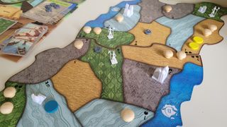 Close up of board and pieces from the Spirit Island board game