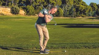 John Howells shows a useful golf backswing drill using a golf