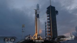 a black and white rocket launches into a cloudy sky