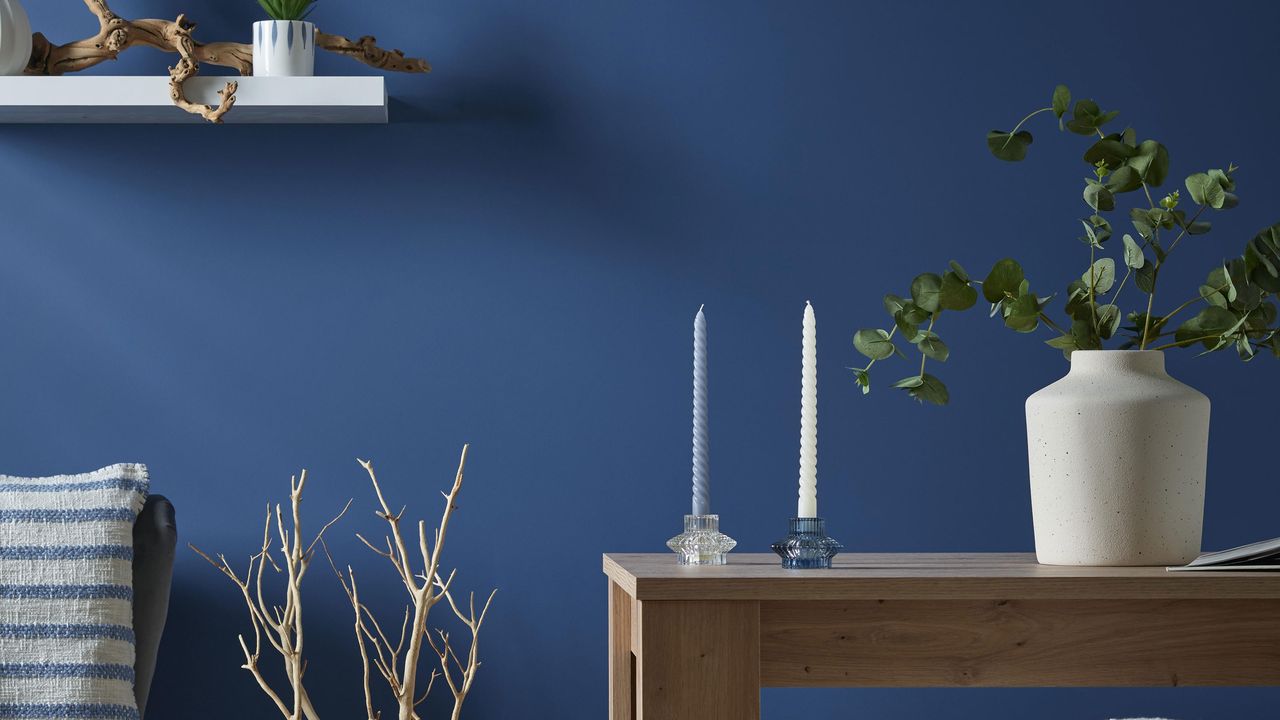 Blue wall with table