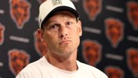 Bears coach Ben Johnson takes questions at a press conference.