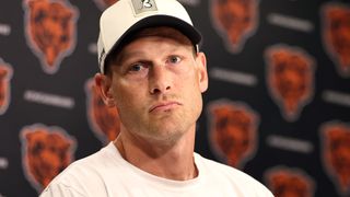 Bears coach Ben Johnson takes questions at a press conference.