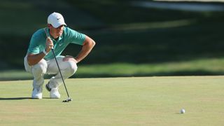 Rory McIlroy lining up a putt during the 2022 BMW Championship