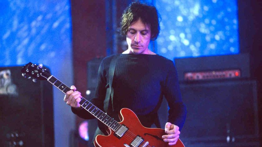 The Cure&rsquo;s Perry Bamonte performing onstage in 2000