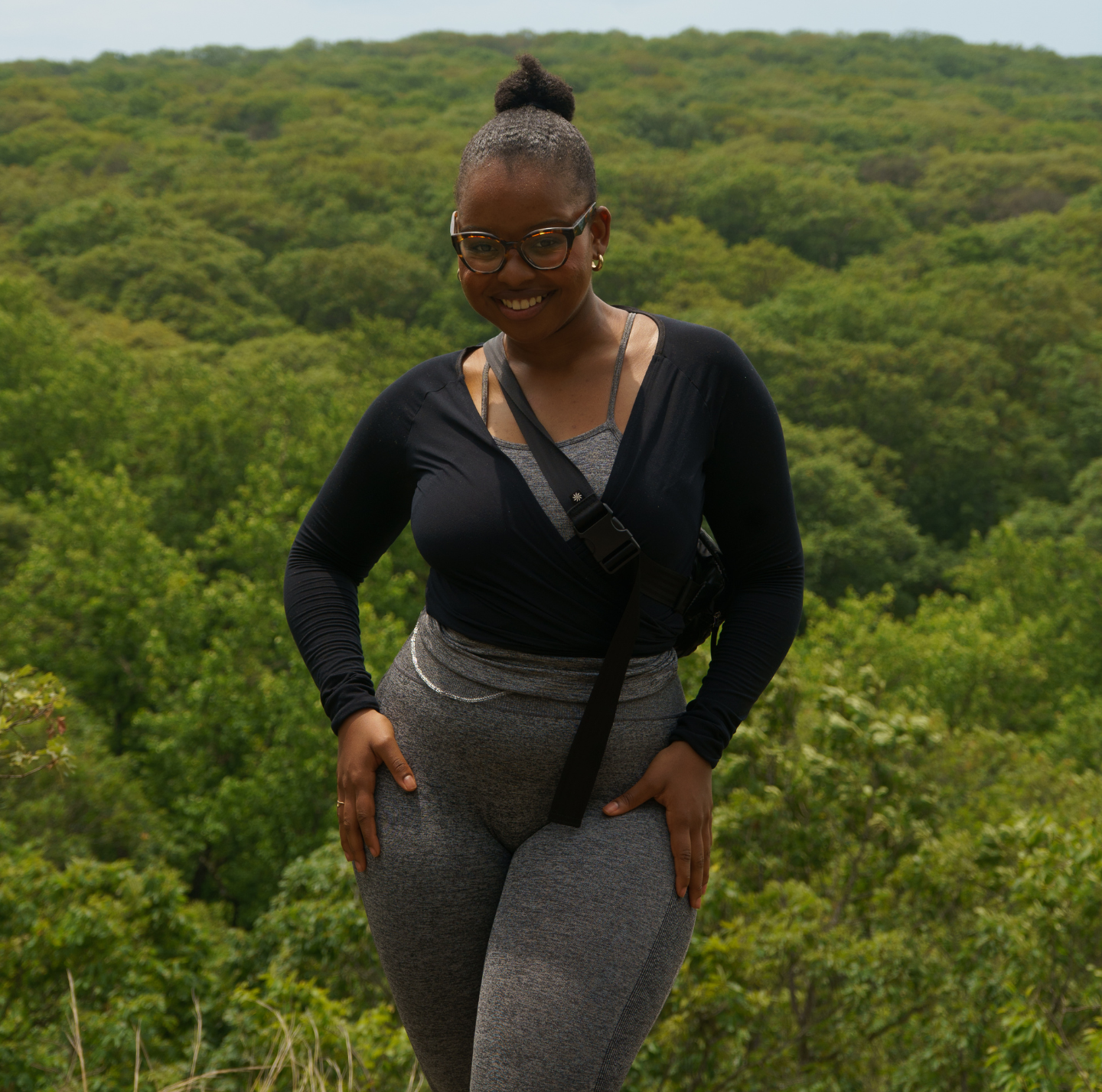 woman with glasses hiking