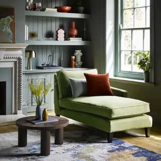 guest room daybed ideas, living room with green daybed/chaise longue, built in storage alcove, side table, grey living room