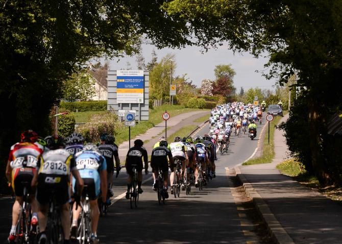 The bunch pass through Summerhill on Stage 1 at the An Post Ras