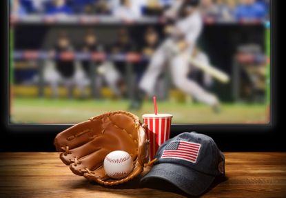 Baseball equipment on the table. 