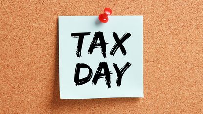 tax day note on bulletin board