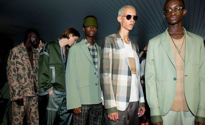 Models wear an array of green hued looks at Ermenegildo Zegna Couture S/S 2019