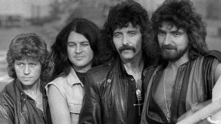 Black Sabbath posing for a photograph with singer Ian Gillan in 1983