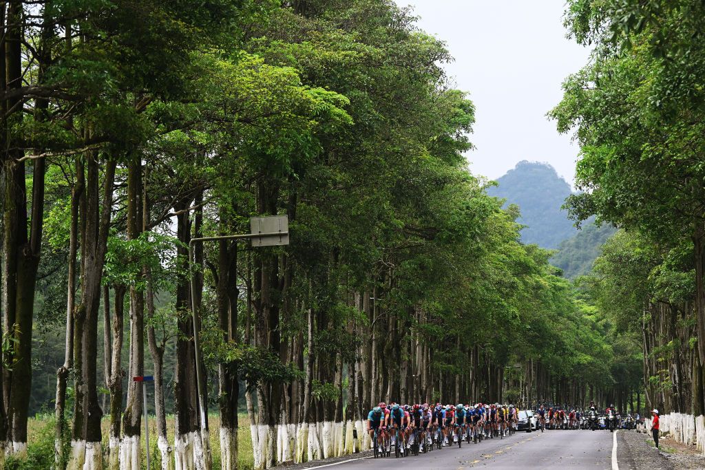 BAMA CHINA OCTOBER 17 A general view of Gleb Syritsa of Russia and Yevgeniy Fedorov of Kazakhstan and Astana Qazaqstan Team lead the peloton during the 5th GreeTour Of Guangxi 2024 Stage 3 a 214km stage from Jingxi to Bama UCIWT on October 17 2024 in Bama China Photo by Dario BelingheriGetty Images