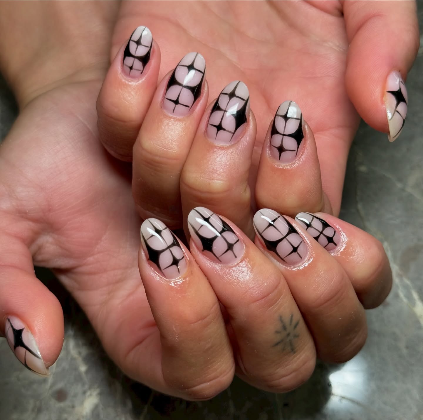 Dua Lipa fishnet star black nail art design