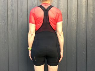Female cyclist wearing the MAAP Women's Short Team Bib Evo shorts