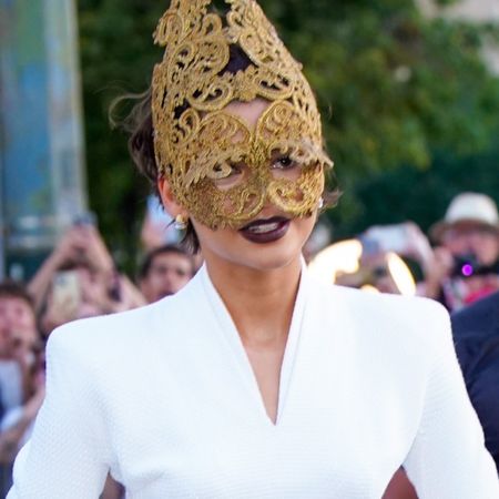 Zendaya arrived at The Odyssey Paris premiere in a vintage dress and a McQueen x Philip Treacy mask