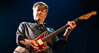 Nels Cline plays his battered Jazzmaster live onstage in 2023.