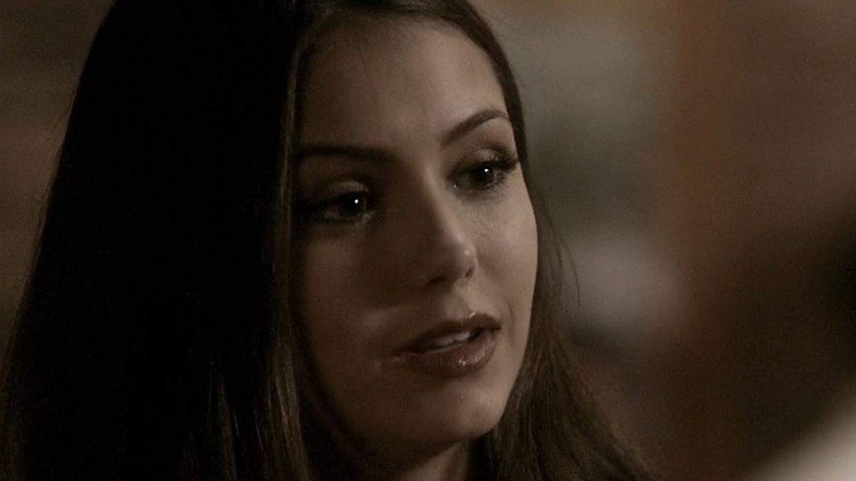 Elena having a drink in a bar in The Vampire Diaries Season 1