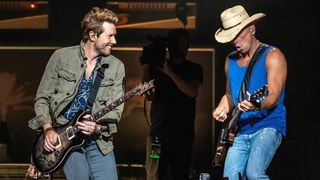 Danny Rader and Kenny Chesney perform live