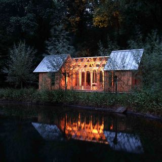 grounded boat shed with wooden interiors