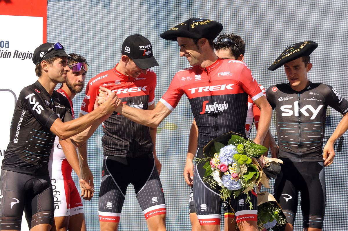 Sky's Michal Kwiatkowski and the retiring Haimar Zubeldia on the podium