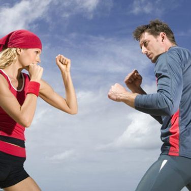 man and woman sparring