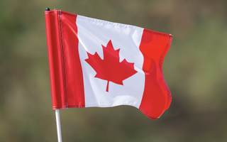 Canada golf flag blowing in the wind