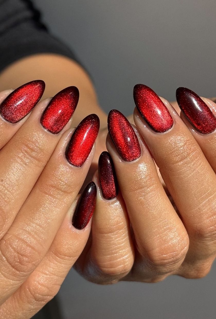 a close-up shot of deep red velvet nails