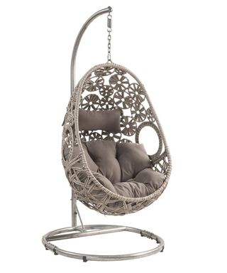 A grey egg-shaped porch swing with intricate weaved circular crochet detail