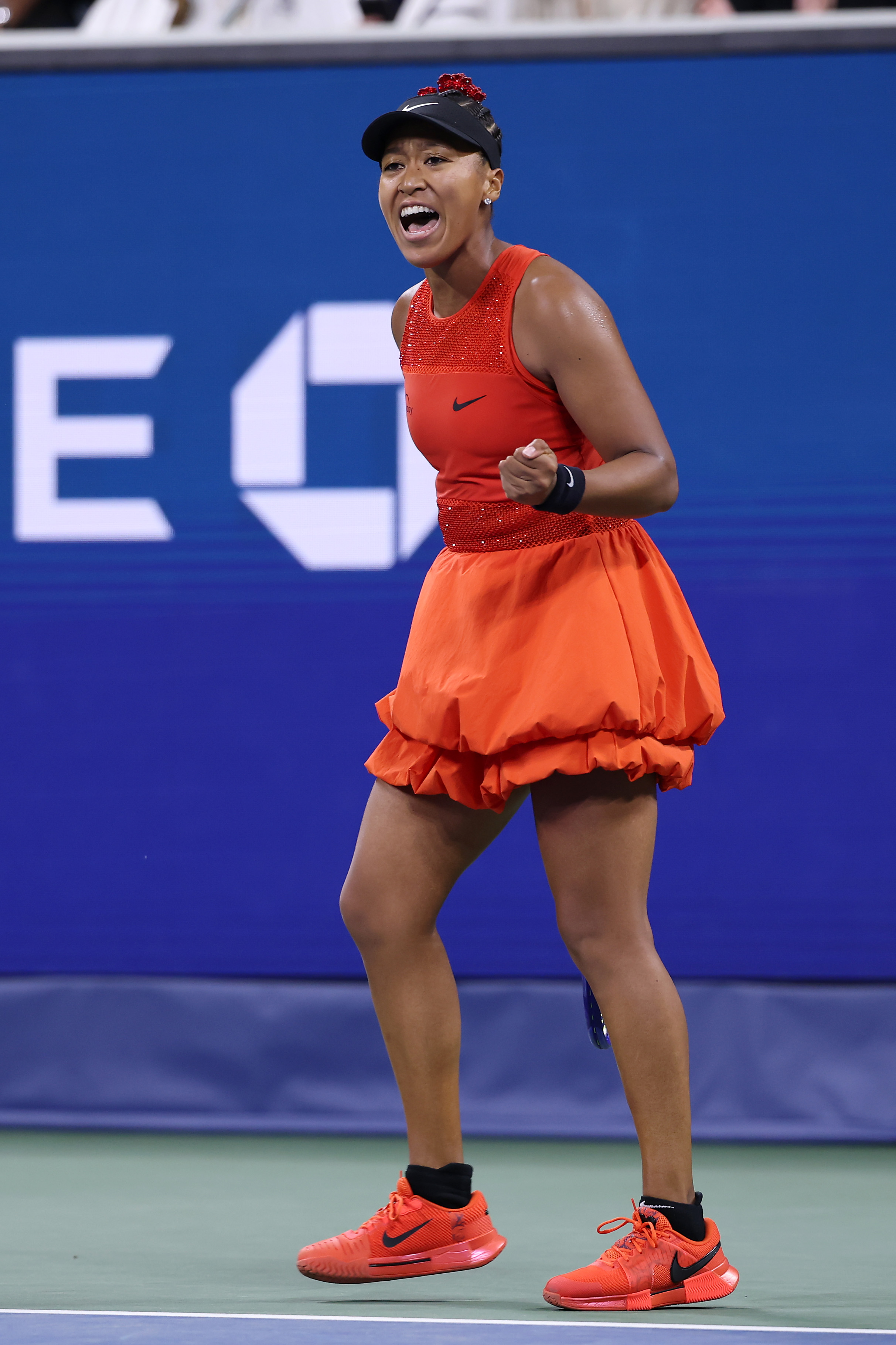 Naomi Osaka competed at the 2025 US Open in an all-red Nike outfit