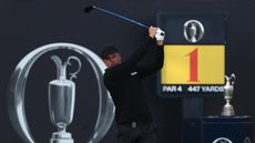 Henrik Stenson hits a tee shot at the opening hole of The Open