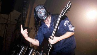 Slipknot’s Mick Thomson performing onstage in London in 2000