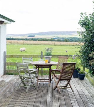cottage patio ideas kilkenny house decked patio area with wooden furniture
